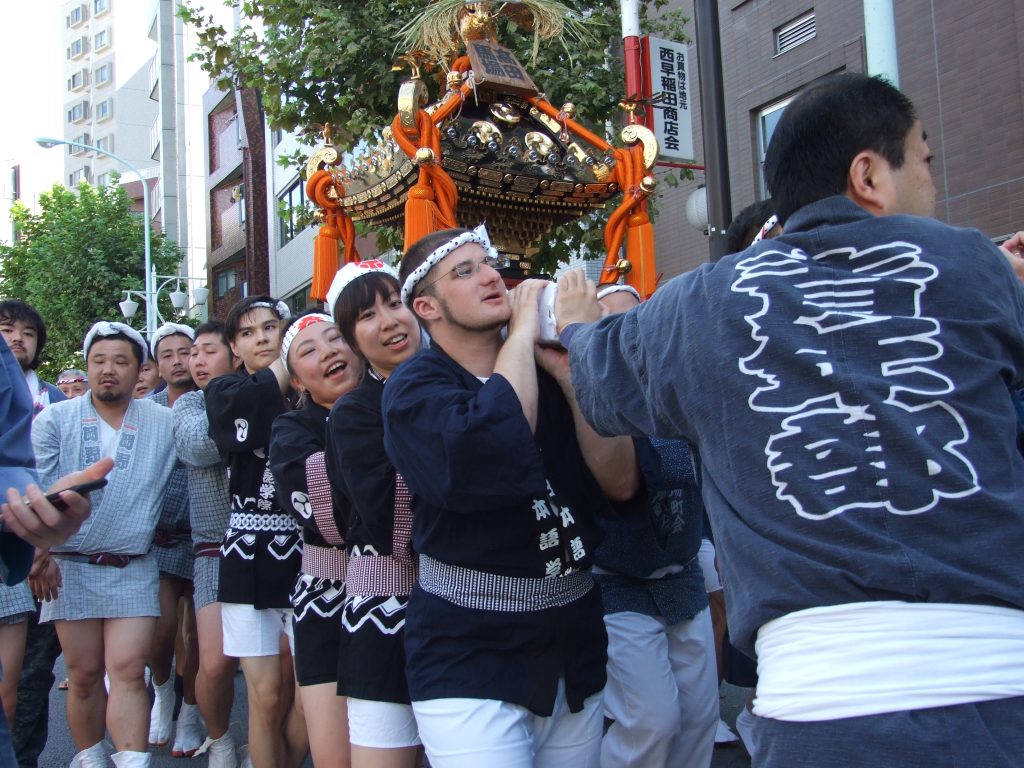 students carrying mikoshi 